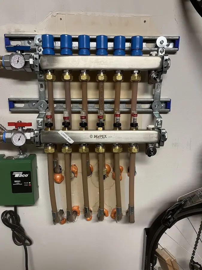 Plumber performing Water Heater Repair at a residential property in Sugar Land